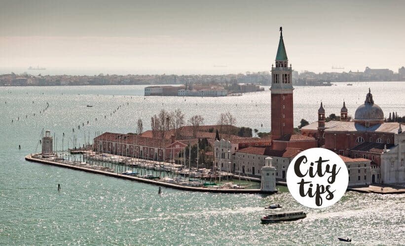 View over Isola di San Giorgio Maggiore from the Campanile tower Shoppen in Venetië? Mis deze winkels niet!