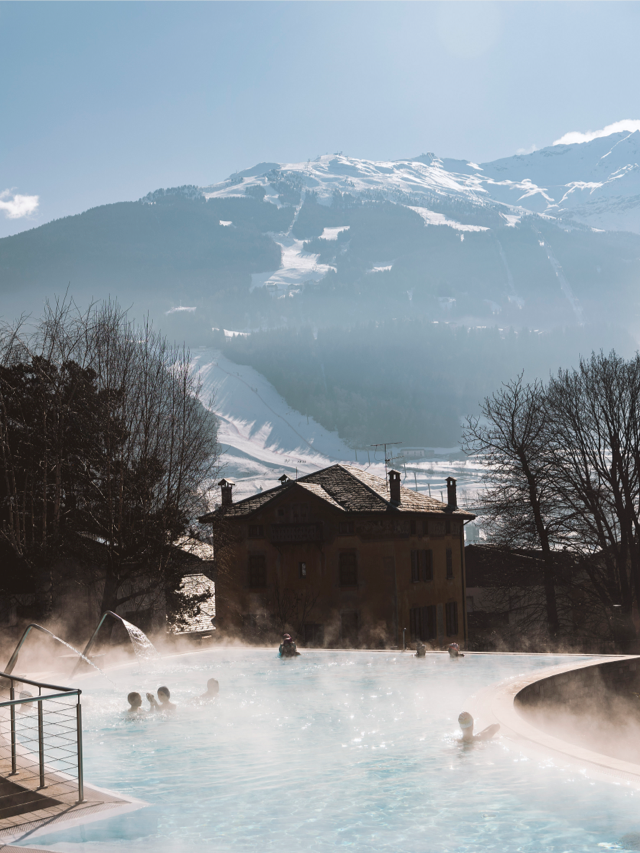 Hot springs with snowy mountains backdrop