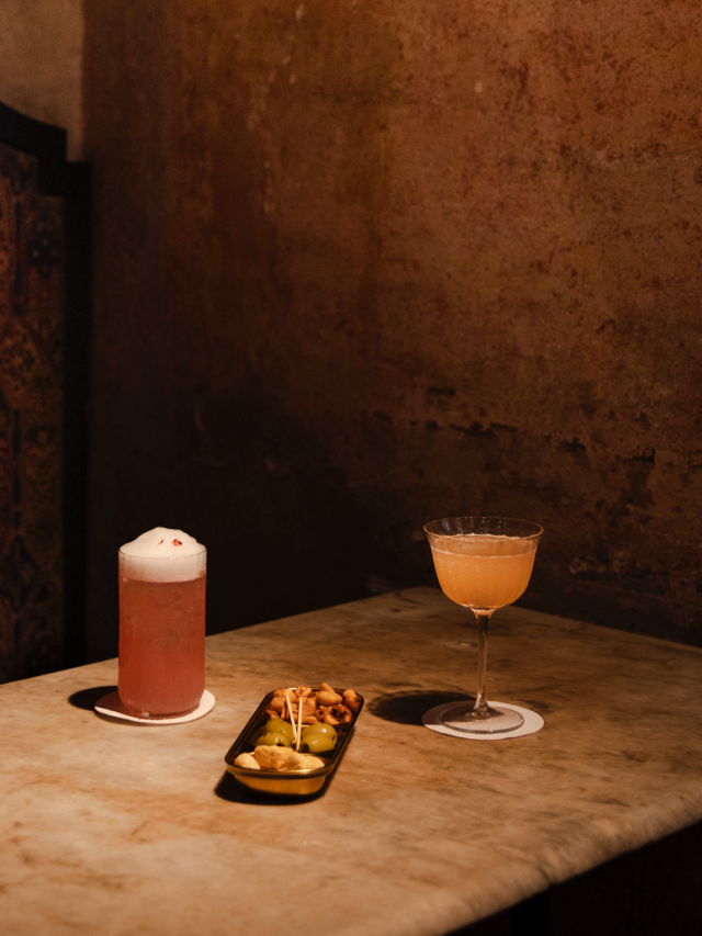 Two cocktails and a snack plate